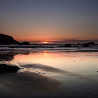 Sunset over ocean at Harris Beach framed photograph print